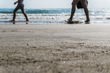 Tropical nature clean beach and white sand in summer with sun light blue sky and bokeh.