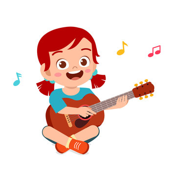 happy cute little kid girl play guitar