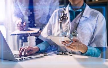 medical technology concept,smart doctor hand working with modern laptop computer with virtual icon...