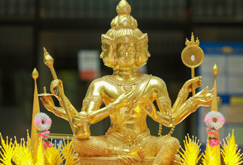 Vishnu statue Gold color with eight arms statue