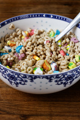A huge bowl of sugary cereals and milk