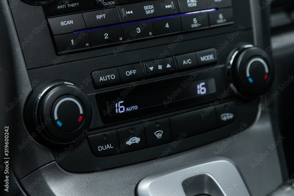 Poster close up instrument automobile panel with climat control view with air conditioning buttons- details