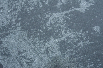 Winter background, frost on the metal. Matte texture.