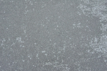 Winter background, frost on the metal. Matte texture.