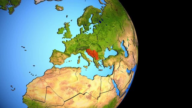 Closing in on Former Yugoslavia on political 3D globe with topography. 3D illustration.