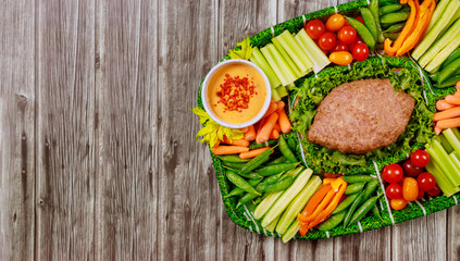 Meatloaf with vegetable colorful platter and hot mayo.