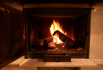 old, dirty and constantly used fireplace in the house