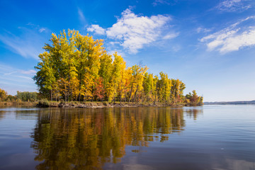 Beautiful autumn landscape. Island on the river
