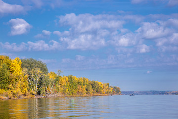 Beautiful autumn landscape. Island on the river