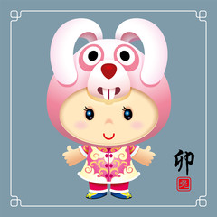 During The Year of Rabbit, Cute little girl wearing traditional costume cosplay as Chinese zodiac Rabbit