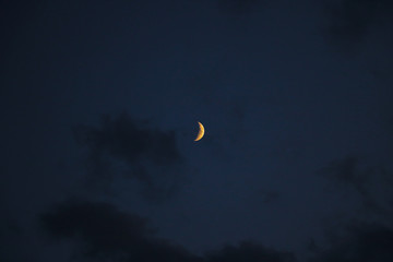 Beautiful month at the night sky with the stars.