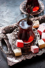 Traditionally served Turkish tea with eastern sweets