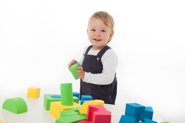 playing with colored blocks, toddler 