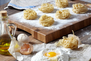 Ready noodles on a beautiful wooden cutting board.