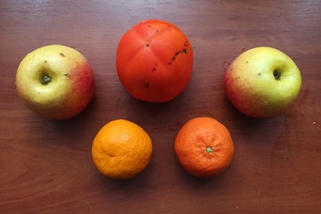 fresh sweet fruits on wooden table
