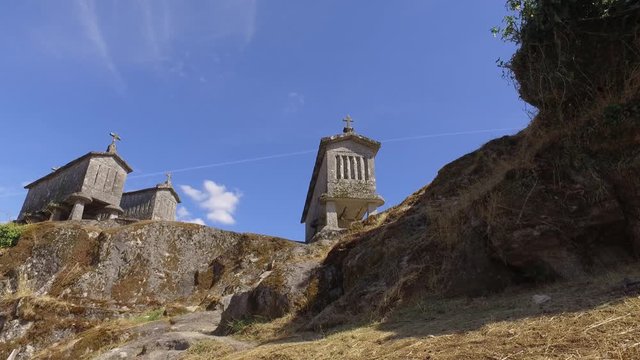 Typical corn stone driers granaries Espigueiros in Soajo village Portugal 4k