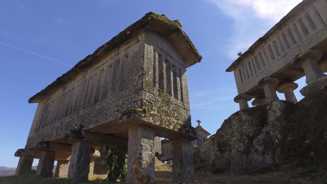 Typical corn stone driers granaries Espigueiros in Soajo village Portugal 4k