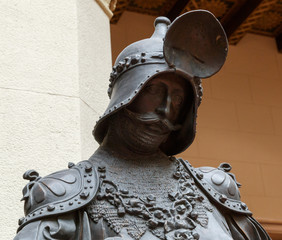 Sculpture of King Arthur old metal statue. Medieval knights armor full size standing warrior. Order...