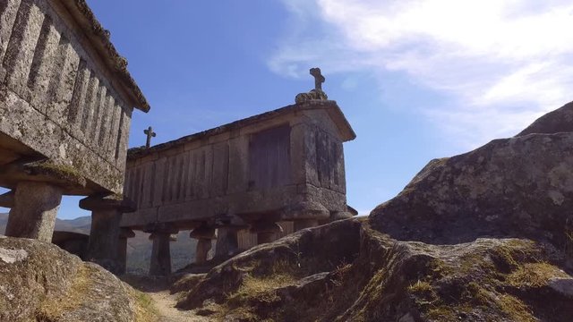 Typical corn stone driers granaries Espigueiros in Soajo village Portugal 4k