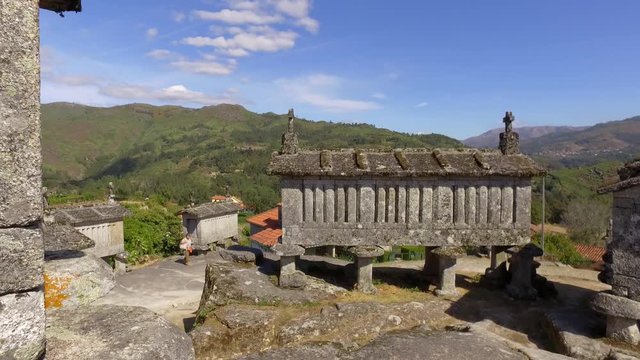 Typical corn stone driers granaries Espigueiros in Soajo village Portugal 4k