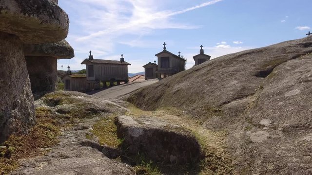 Typical corn stone driers granaries Espigueiros in Soajo village Portugal 4k