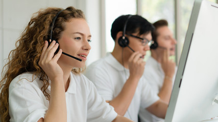 business background of customer service agents on telephone service to customers at helpdesk call center