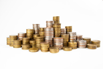 Many monetary coins lie and stand in columns depicting monetary wealth.