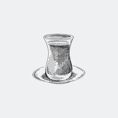 Hand-drawn vintage sketch of tea glass on a saucer on a white background. The glass in the shape of a pear used in Azerbaijan is also known as armud glass.
