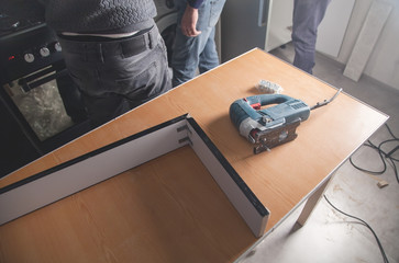Electric saw on the table. Construction, Industry, Housework