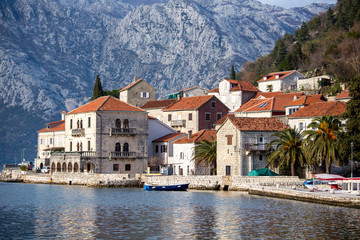 Fototapeta na wymiar The medieval old European city on the Adriatic. Sea coast. Old stone houses.