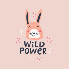 Wild power decorative hand drawn vector lettering. Freedom slogan with cute bunny face scandinavian style illustration. Funny tshirt print, banner design element. Creative saying with kawaii rabbit