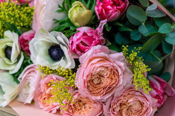 Close-up Large Beautiful bouquet of mixed flowers. Flower background and Wallpaper. Floral shop concept . Beautiful fresh cut bouquet. Flowers delivery