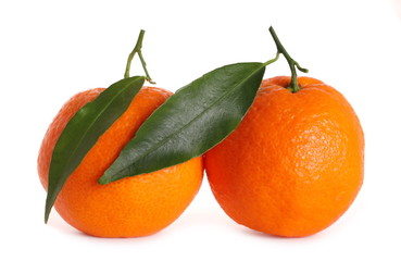 Mandarins with leaves isolated on white background