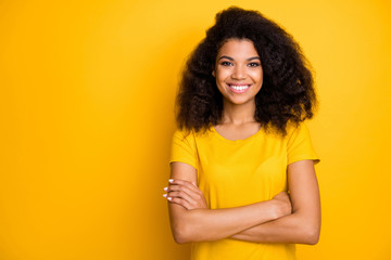 Close-up portrait of her she nice attractive lovely pretty content cheerful cheery wavy-haired girl folded arms isolated over bright vivid shine vibrant yellow color background