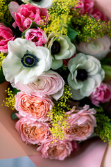 Close-up Large Beautiful bouquet of mixed flowers. Flower background and Wallpaper. Floral shop concept . Beautiful fresh cut bouquet. Flowers delivery