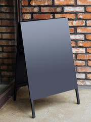 Signboard Stand Black Blank Menu Shop Restaurant with Brick wall