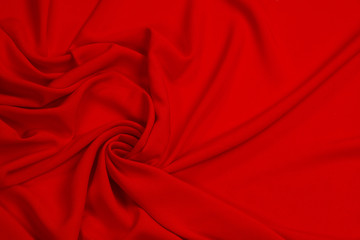 Fabric suit fold top view. Red textile