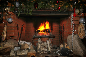 decorated christmas fireplace at night