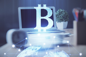 Fototapeta premium Double exposure of blockchain theme hologram and table with computer background. Concept of bitcoin crypto currency.
