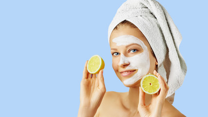 Cosmetology, skin care, face treatment, spa and natural beauty concept. Woman with facial mask...