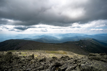 Panoramic view on the peak of Mount Washington, New Hampshire (USA). The shot covers the rough...
