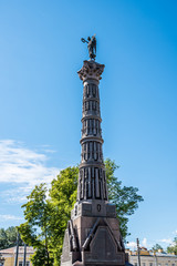 Column of Glory near the Trinity Cathedral in St Petersburg. The column is set with cannon barrels and is topped by a winged figure holding a wreath.