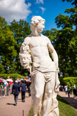 Fototapeta premium A statue in The Catherine Palace, a Rococo palace located in the town of Tsarskoye Selo, 30 km south of St. Petersburg, Russia. It was the summer residence of the Russian tsars.
