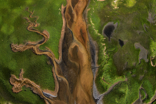Aerial photography of Cape Cod`s awesome marshlands and pure wilderness. The picture shows green environment and an infinite diversity of the nature.