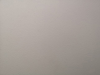 Cream color painting of polished surface on concrete plastering background