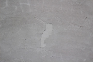 Textured wall with crack for background. White Stucco Textured Wall can be used in design.
