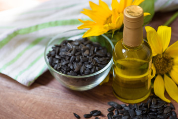 sunflower seed oil on wood background