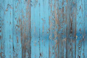 Fototapeta na wymiar Vintage wood background with peeling paint. Fence made of boards