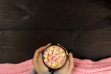 Colorful marshmallows hearts in a cup of tea or coffee. copy space for your text