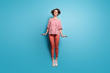 Full length body size view of her she nice attractive lovely cheerful cheery slim fit girl jumping...